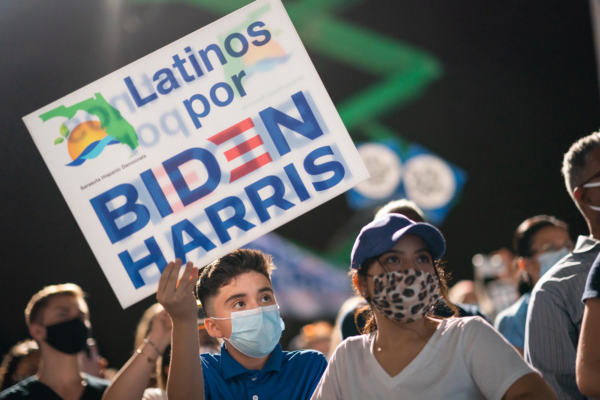 A Biden-Harris supporter waves a 