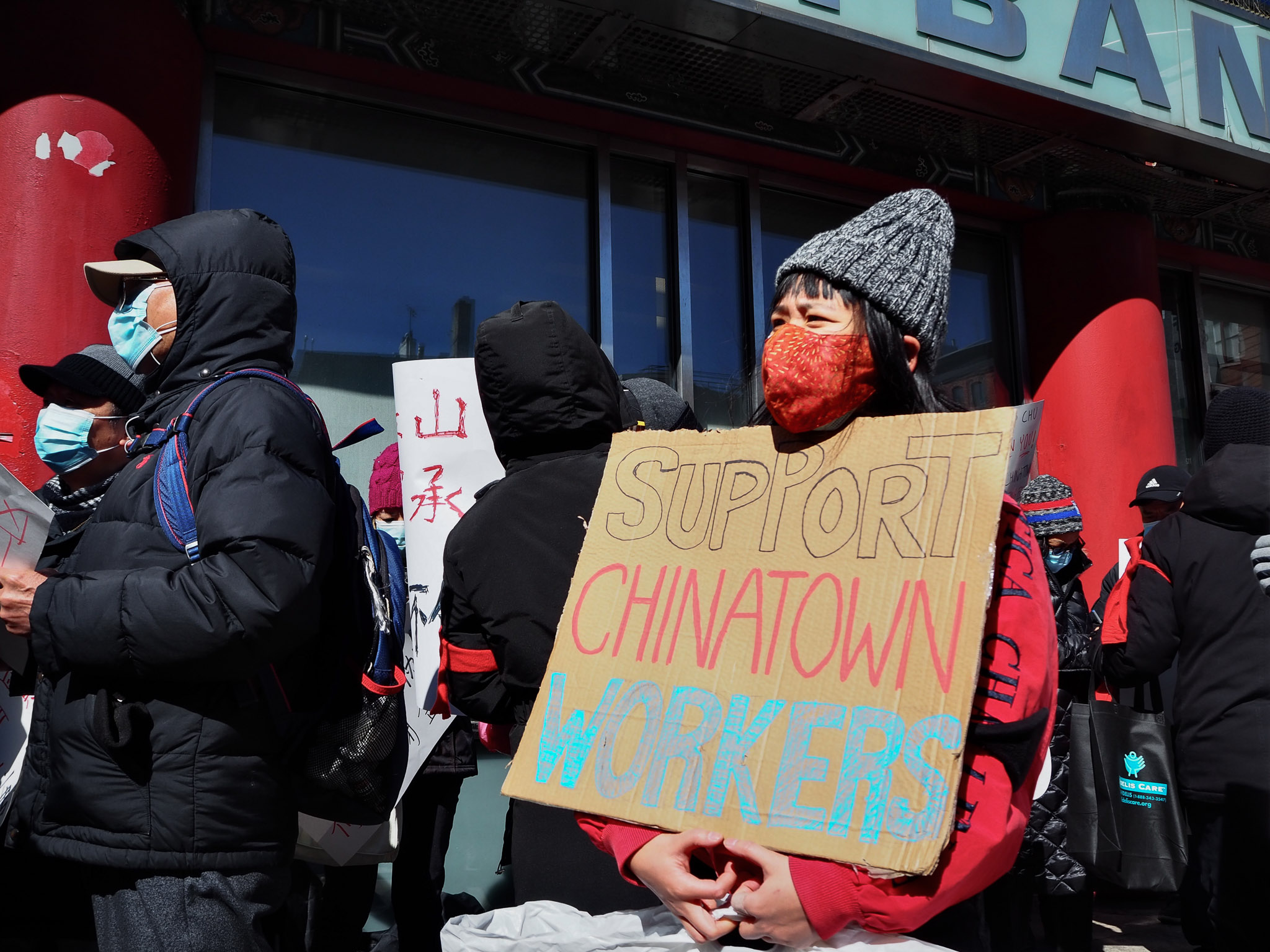 Workers and their supporters protest the impending closure of Chinatown's Jing Fong restaurant dining room outside its landlord East Bank. Photo: Amir Khafagy for Documented