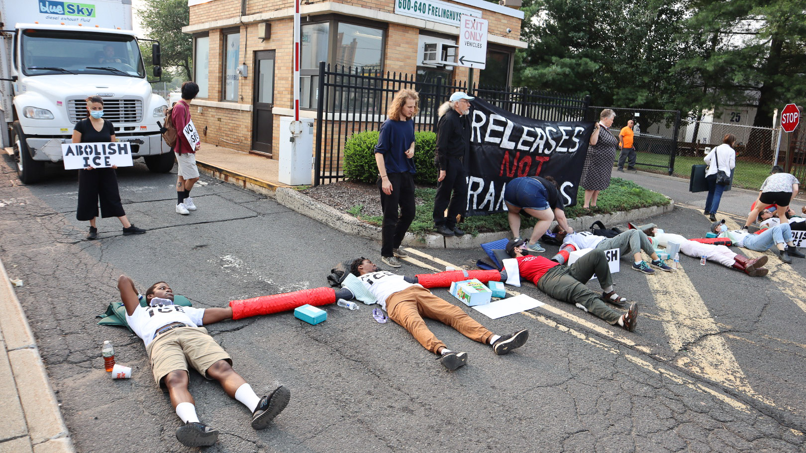 Activists blocked entrances to a DHS Investigations field office in Newark to protest the transfer and deportations of detainees.