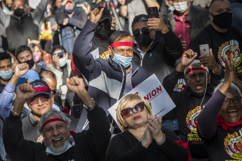 NYC Taxi drivers celebrate at City Hall