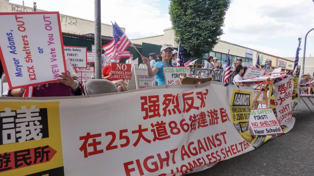 Hundreds of Chinese community members in South Brooklyn have protested in front of the planned homeless shelter every day since Councilmember Zhuang was arrested by police during a protest on July 17th. Photo: April Xu for Documented.