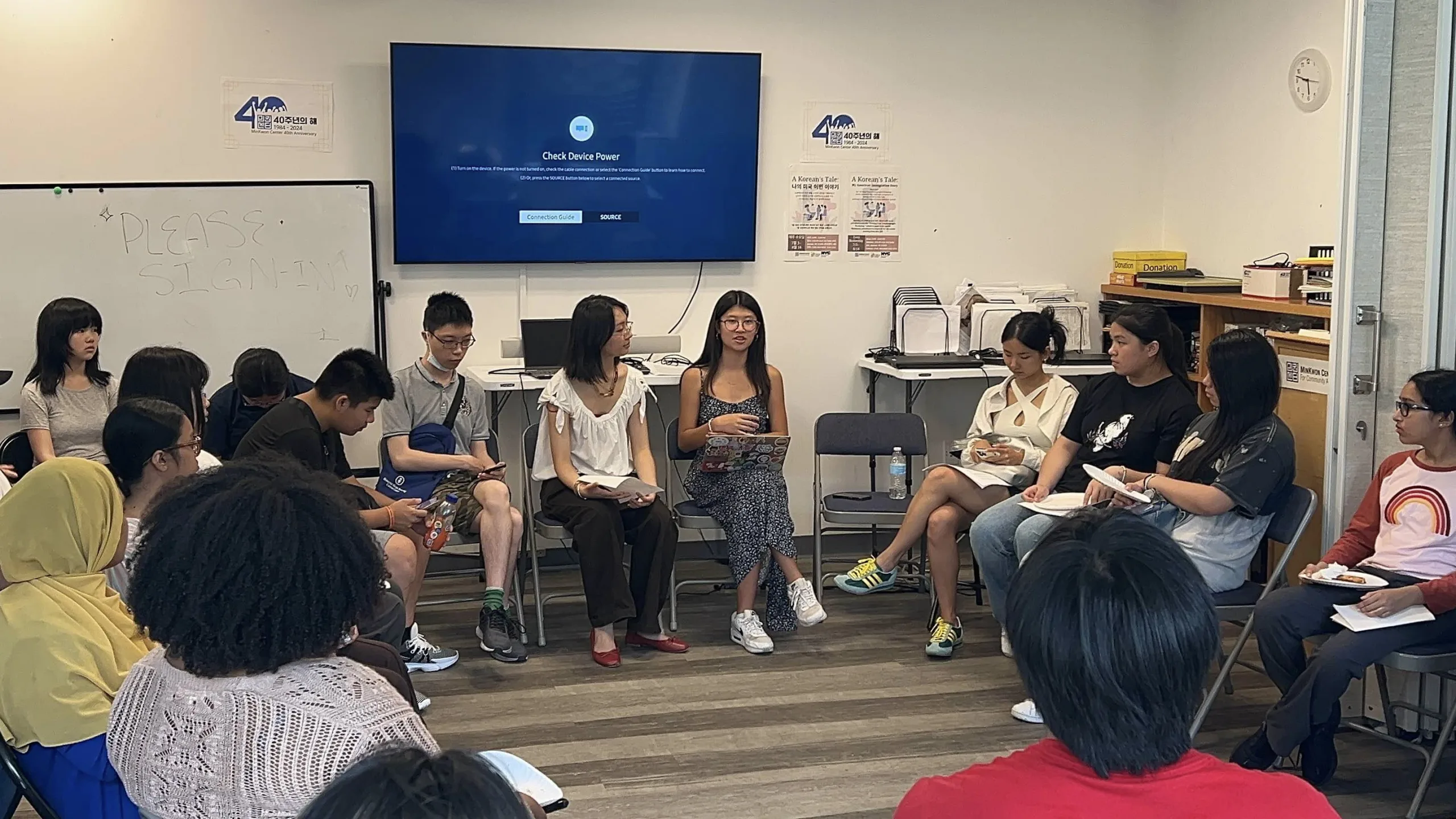 MinKwon's Organizing Committee leading a community discussion after taking young people on a Housing Tour of Flushing to explore the history of development and gentrification. Photo: provided by Gwen Phagnasay Le