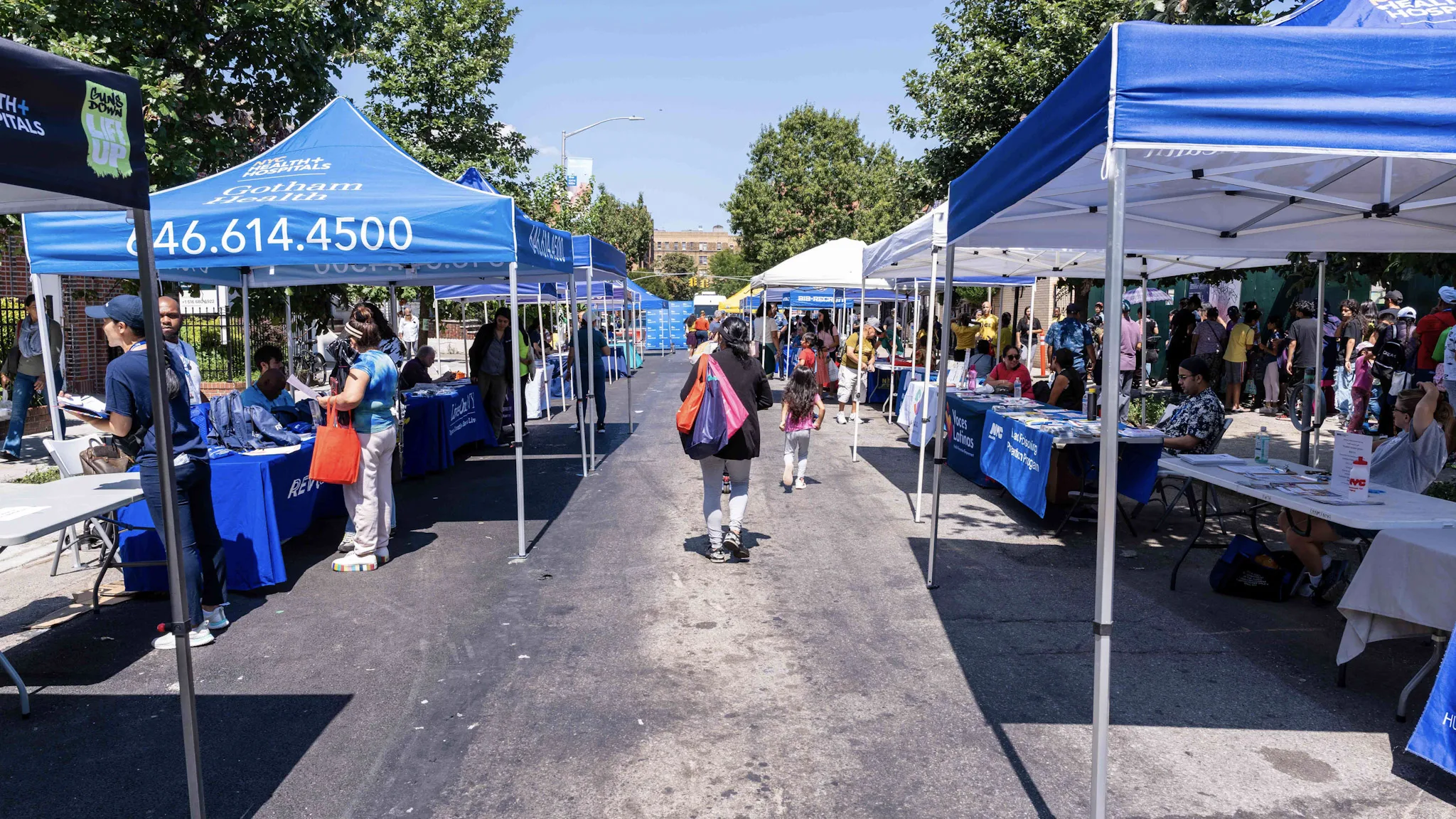 City health agencies and local non-profit, NICE, hosted a back-to-school fair to provide healthcare information and school supplies to residents in Queens. Photo by Rommel H Ojeda for Documented